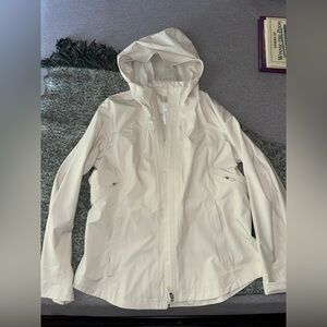 Brand new women’s Lululemon rain coat. Cream. Never worn!